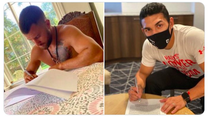 Lomachenko y López firmando