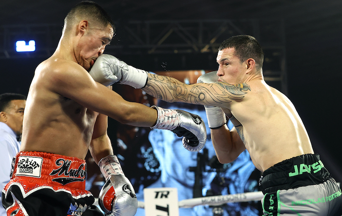 LAS VEGAS, NV - FEBRUARY 20: Gabriel Flores Jr and Jayson Velez exchange punches during their fight at the MGM Grand Conference Center on February 20, 2021 in Las Vegas, Nevada. (Photo by Mikey Williams/Top Rank Inc via Getty Images)